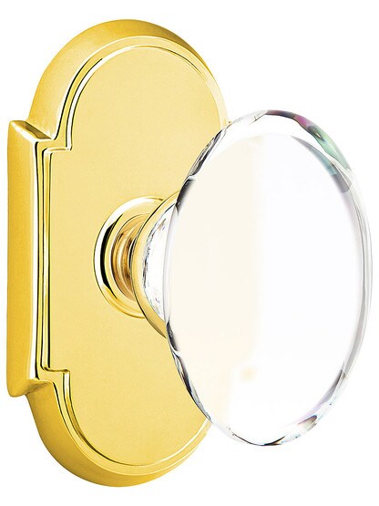 Arched Rosette Door Set With Hampton Crystal Knobs in Piolished Brass.